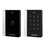 Two black door access devices: a card reader on the left and a numeric keypad on the right, mounted for entry control.