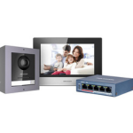 Home network setup: a NAS on the left, a monitor showing a family photo in the center, and a blue network switch on the right.
