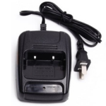 Black AC battery charger with attached power cord and two-prong US plug.